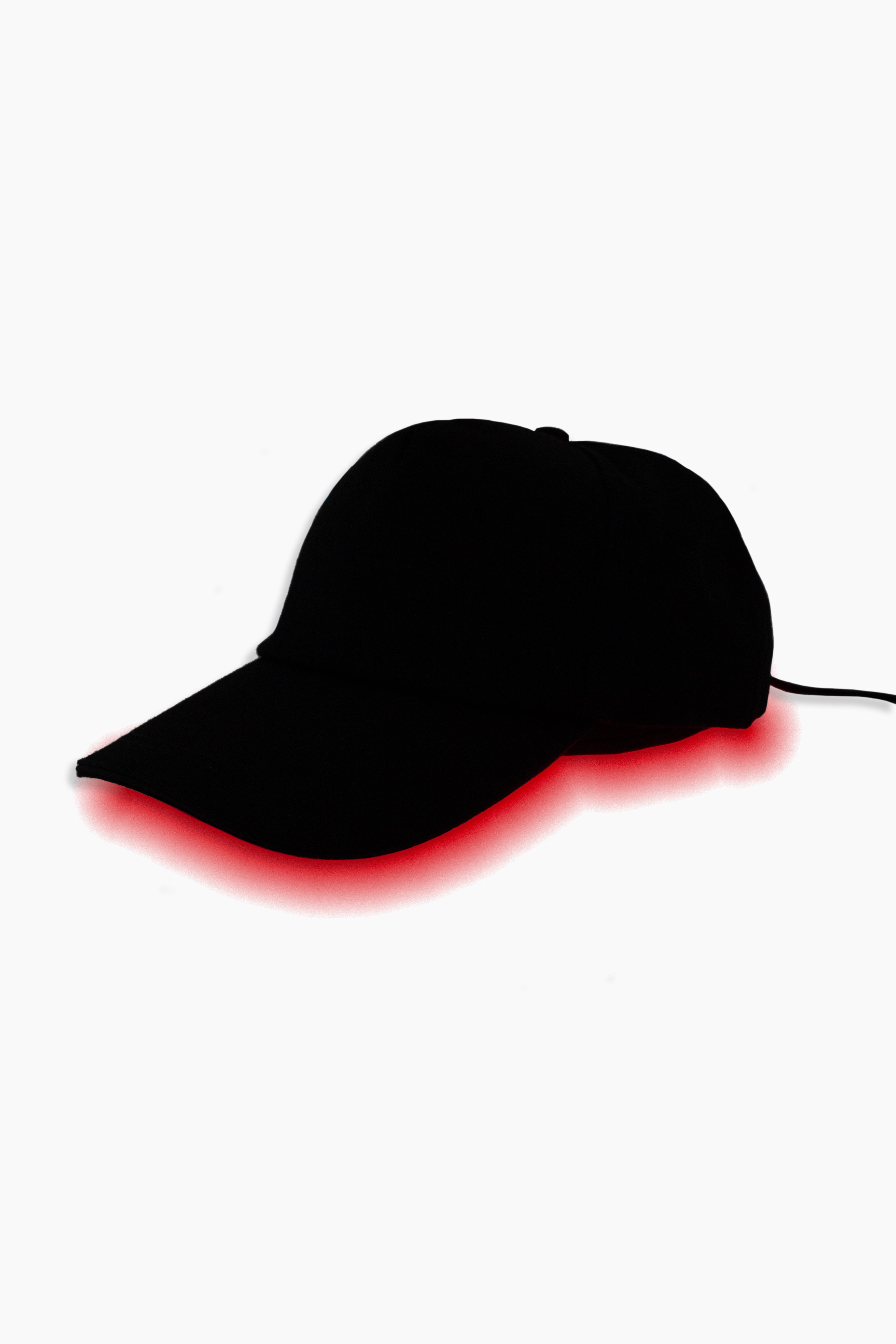 Black cap with red light on a white background